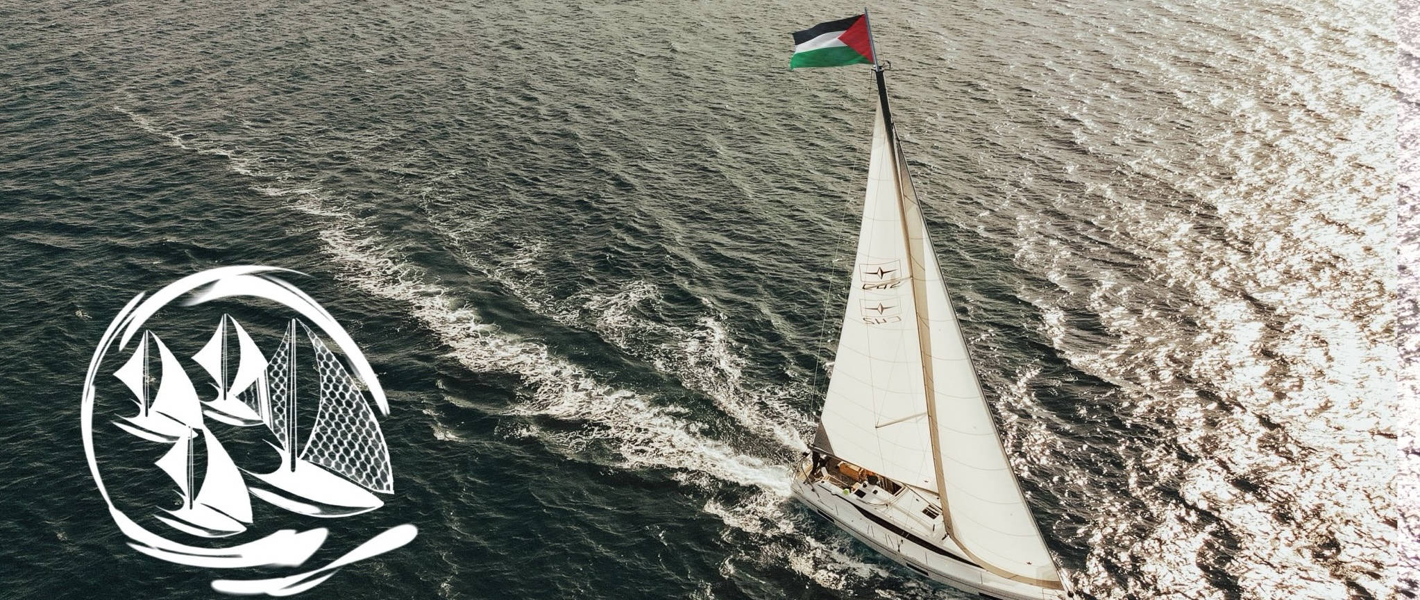 Sailboat with Palestinian flag sailing on the Mediterranean Sea - Thousand Madleens to Gaza campaign